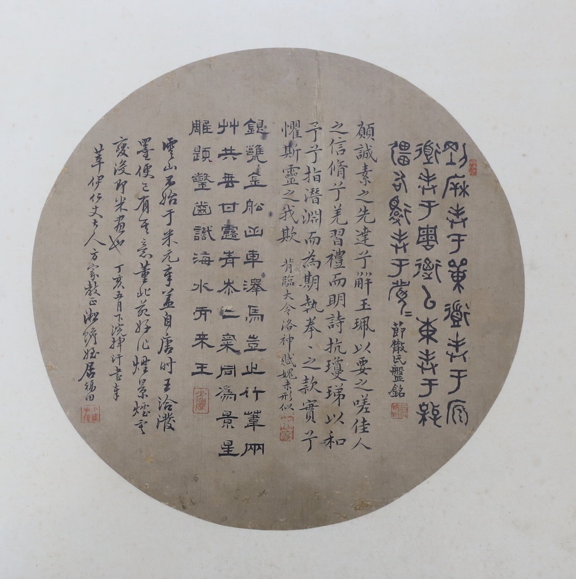 Two 19th century Chinese inscribed fan leaves, 24.5cms diameter
